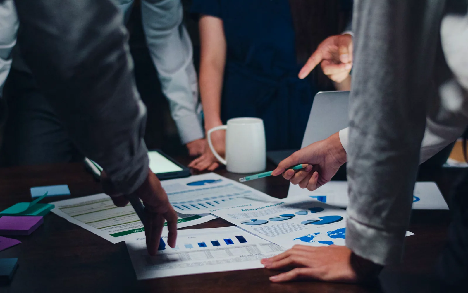 Professional team reviewing business and financial information